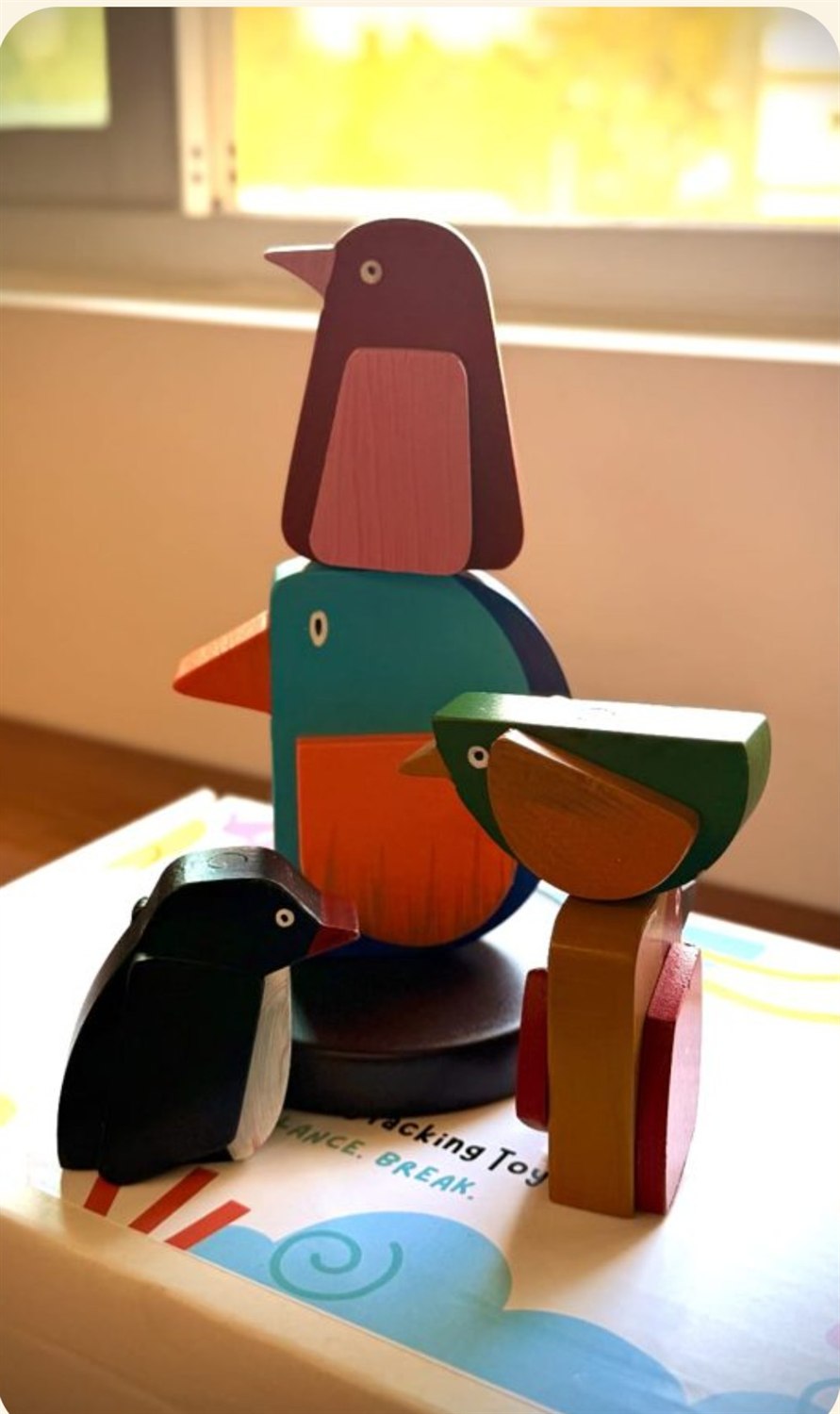 The five-bird tower: five hand-painted magnetic wooden birds stacked on a round base